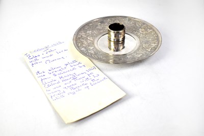 Lot 913 - A white metal dish with incised floral band of...