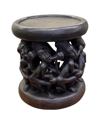 Lot 1057 - An African Bamileke or Bamum carved figural...