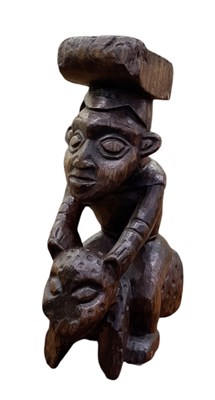 Lot 1126 - An African carved wooden Bamileke or Bamum...