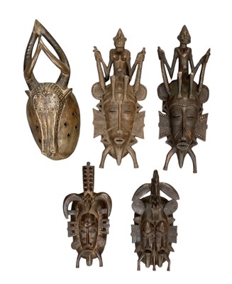 Lot 1046 - A pair of African Senufo tribe Kpelie masks,...