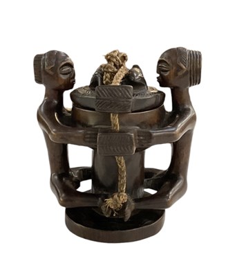 Lot 1114 - An African carved wooden Luba-Hemba double...