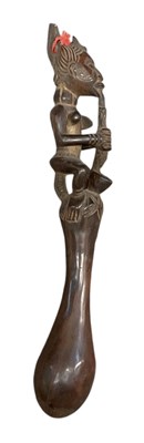 Lot 1042 - A carved wooden Igbo pestle, the top...