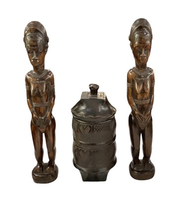 Lot 1066 - An African carved wooden Kuba lidded pot,...
