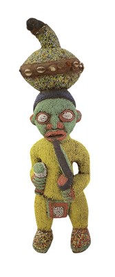 Lot 1065 - A wooden beaded Cameroon Bamum/Bamileke figure...