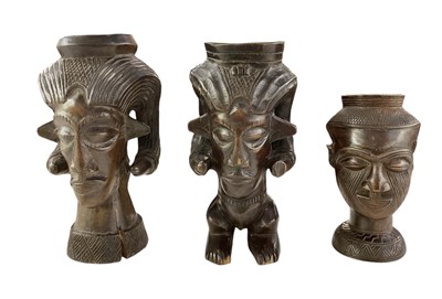 Lot 1069 - Three African carved wooden Kuba cups, all...