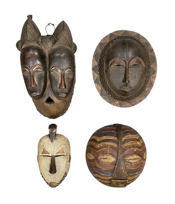 Lot 1070 - An African carved wooden Baule Jumeaux double...
