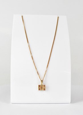 Lot 888 - A 9ct yellow gold flat curb link chain...