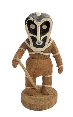 Lot 1110 - A small African carved wooden straw clad...