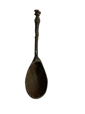 Lot 1107 - A Benin bronze spoon, the top surmounted with...