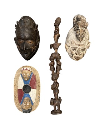 Lot 1029 - A Yoruba totem pole, with carved decoration of...