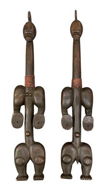 Lot 1018 - A pair of African male and female Baule/Tikar...