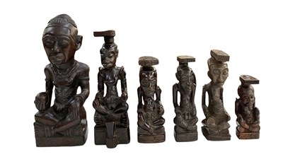 Lot 1032 - Six African carved wooden Kuba Kings, height...
