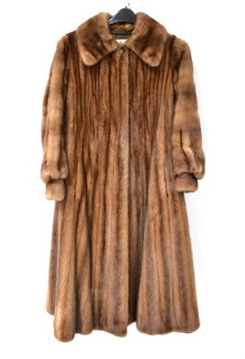 Lot 385 - A full-length mink coat, with wide collar and...