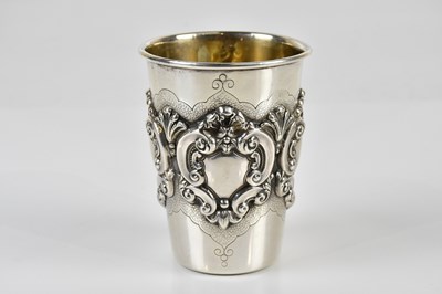 Lot 1309 - A sterling silver beaker with applied...