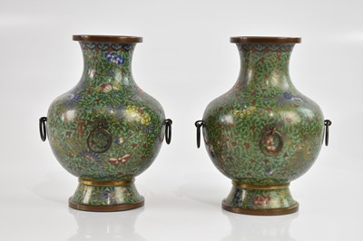 Lot 2863 - A pair of green ground cloisonné vases, with...