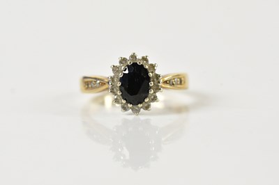Lot 168 - A 9ct yellow gold sapphire oval floral ring,...