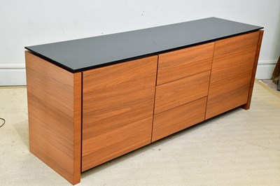 Lot 2215 - A modern glass topped sideboard with three...