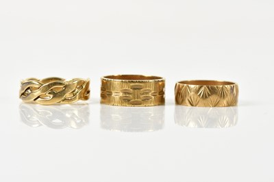 Lot 1451 - Three 9ct yellow gold wedding bands, size R, O...