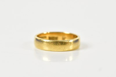 Lot 1474 - A 22ct yellow gold wedding band, size K,...