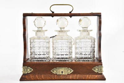 Lot 2527 - An early 20th century oak cased three section...
