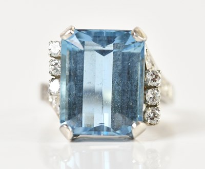 Lot 1298 - A white metal aquamarine and diamond ring, the...