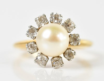 Lot 1313 - A yellow metal diamond and pearl ring, the...