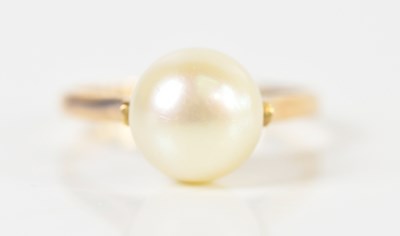 Lot 1516 - A yellow metal cultured pearl dress ring, size...