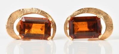 Lot 1683 - A pair of yellow metal screw back earrings,...