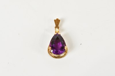 Lot 386 - A yellow metal amethyst and pearl pear shaped...
