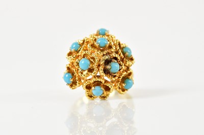 Lot 1320 - A yellow metal turquoise domed dress ring,...