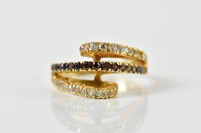 Lot 1337 - An 18ct yellow gold diamond and black diamond...
