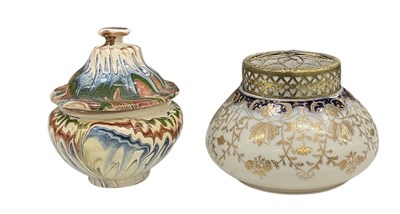 Lot 562 - A marbled agateware lidded pot, height 15.5cm,...