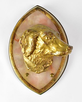 Lot 352 - An alabaster wall plaque set with a moulded...