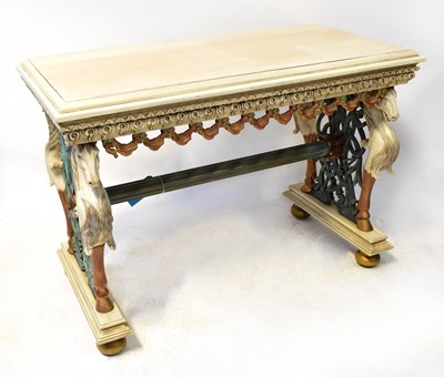 Lot 50 - A Victorian-style carved and painted console...