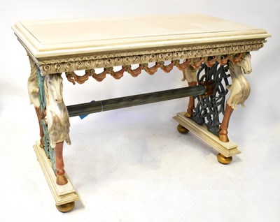 Lot 50 - A Victorian-style carved and painted console...