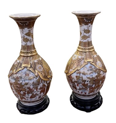 Lot 1167 - A pair of Japanese Meiji period Satsuma bottle...