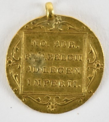 Lot 1585 - A Dutch Willem III one ducat coin, 1849, with...