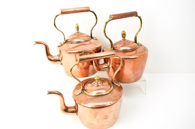 Lot 495 - Three Victorian copper kettles of similar...