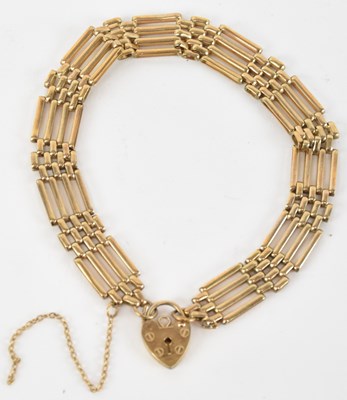 Lot 1461 - A 9ct yellow gold gate link bracelet with...