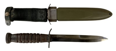 Lot 421 - A WWII U.S. M3 knife, the blade inscribed...