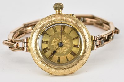 Lot 1693 - A 14k yellow gold lady's wristwatch in the...