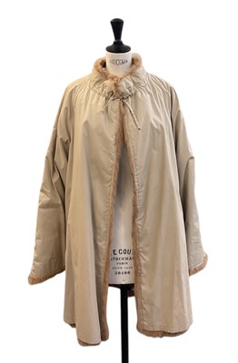 Lot 483 - A rabbit fur reversible raincoat.