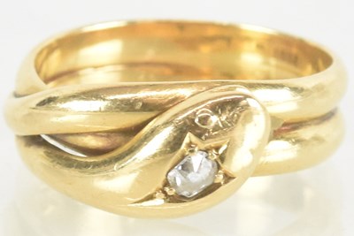 Lot 1387 - An 18ct yellow gold white stone set ring,...