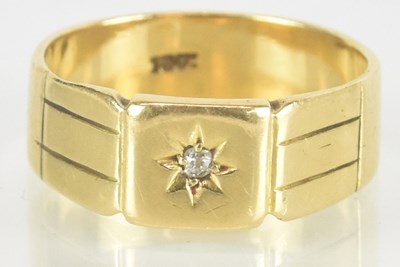 Lot 1404 - An 18ct yellow gold diamond set signet ring,...