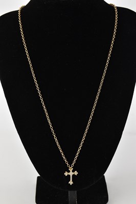 Lot 1474 - A small cross pendant clad in small cubic...
