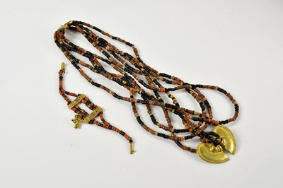 Lot 1589 - A pre-Columbian bead multistrand necklace,...