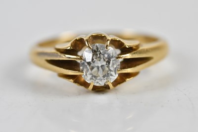 Lot 78 - An 18ct yellow gold diamond set solitaire ring,...