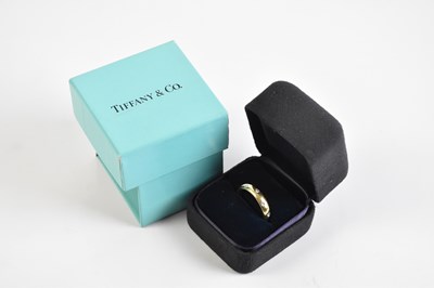 Lot 2072 - TIFFANY & CO; an 18ct yellow gold and diamond...