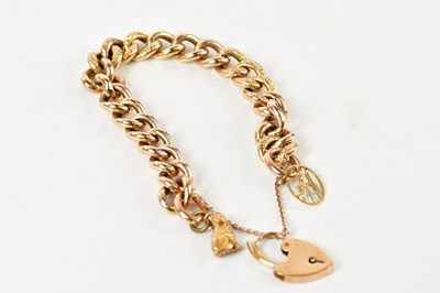 Lot 1550 - A 9ct yellow gold hollow curb link bracelet,...