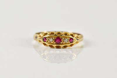 Lot 1502 - A yellow metal ruby and diamond five stone...
